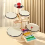 Set Instrumente Muzicale Montessori din Lemn cu Tobe, Xilofon si Percutie pentru Copii Set Instrumente Muzicale Montessori din Lemn cu Tobe, Xilofon si Percutie pentru Copii